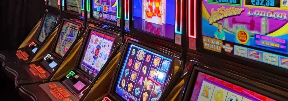 Luxury player in a high-end gaming hall by a grand roulette setup — the classic premium TKHOT atmosphere for BD